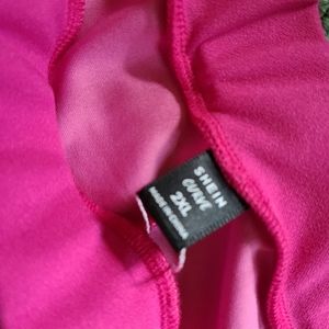 Shein bell bottom pink pants with heart cut outs